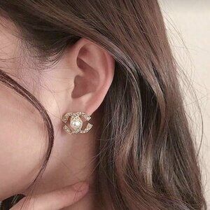 Chic Chanel CC Gold Earrings with Pearl Accent